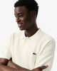 Crèmekleurige gebreide polo Lacoste - AH1043-61/70V